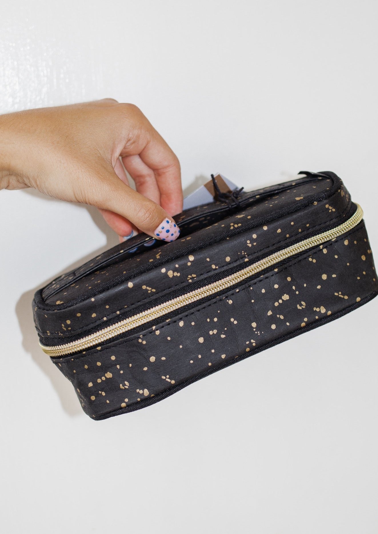 Gold Splatter On-The-Go Makeup Bag - Constructed of washable paper